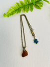 Rich Brown Sea Glass Pendant Necklace with a Lovely Flower Bead