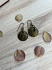 Antique Brass Wood Grain Textured Earrings with Garnet