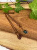 Rich Brown Sea Glass Pendant Necklace With a Beautiful Flower Charm